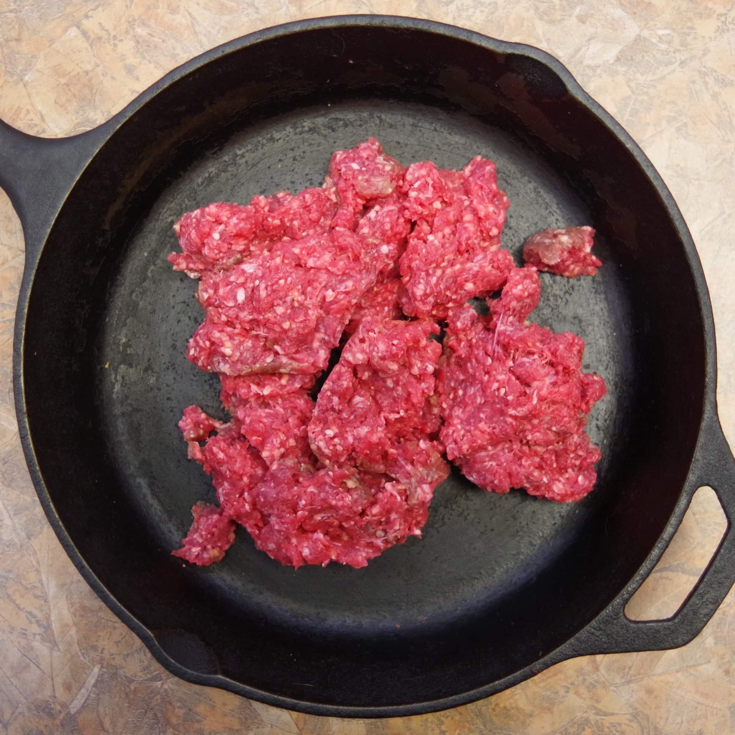 Ground Beef ~ 85 - 90 percent marbled beef w/ no added fat